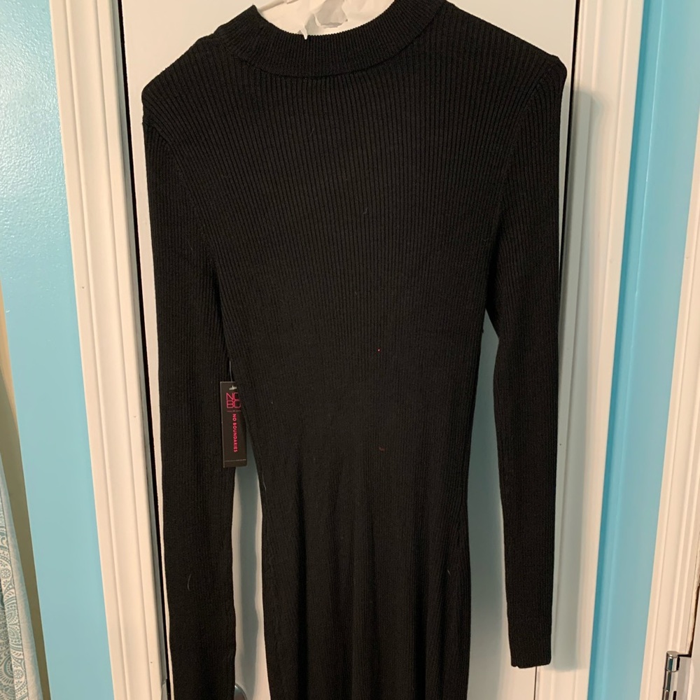 Black knit dress never worn with tags.  No Boundaries Medium (7-9) .